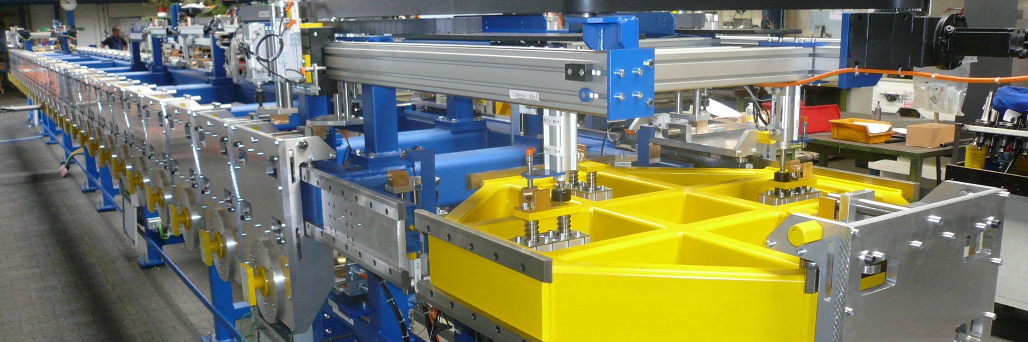 Conveying system for automotive parts