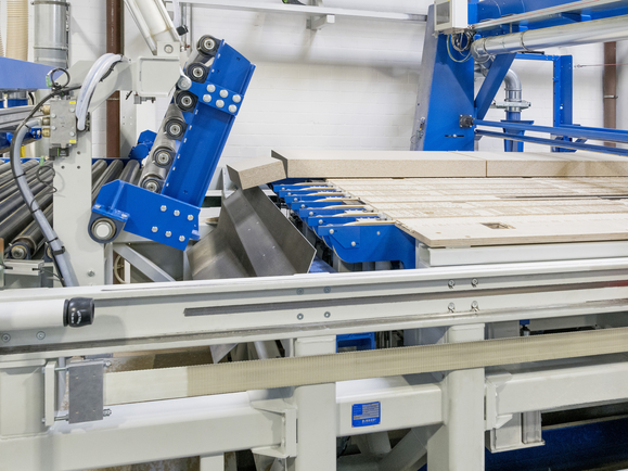 Roller conveyor with wast flap, part of MHF Panel Sizing Saw